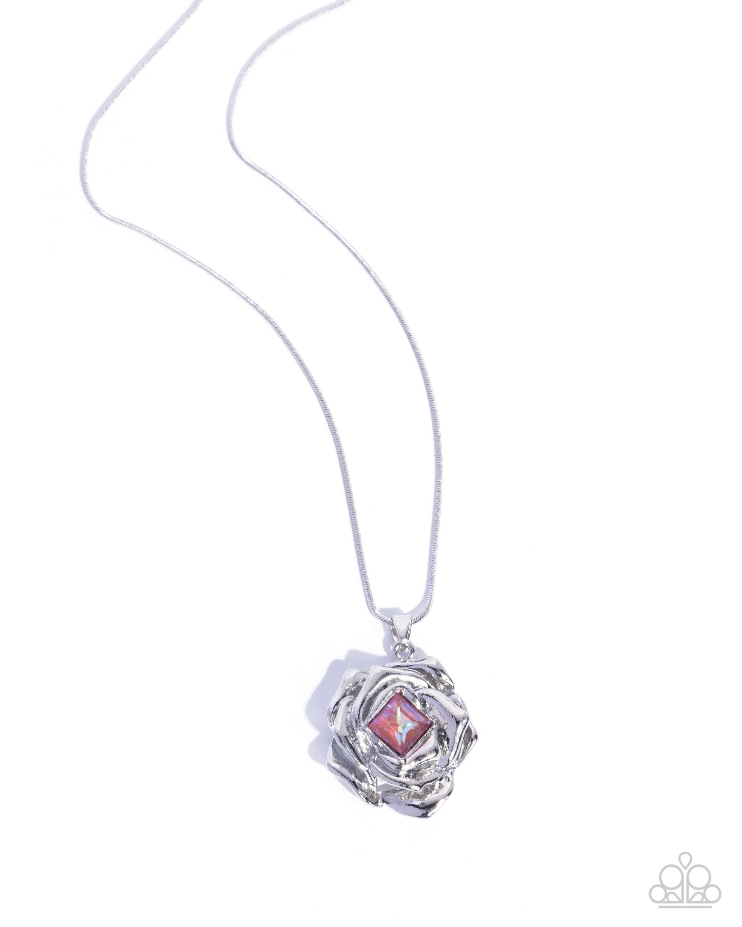 Necklace with a silver pendant featuring a pink gem on a white background